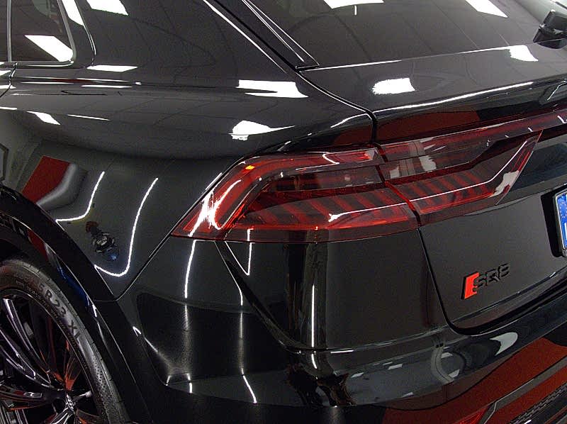 Nanotechnological treatment on a black Audi Q8